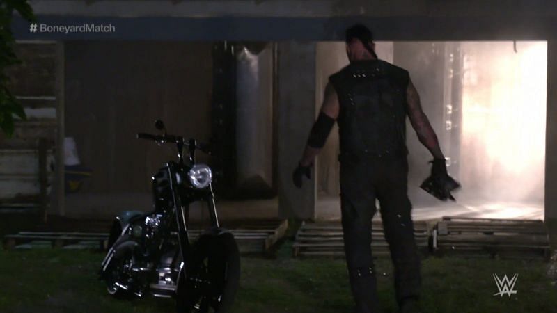 The Undertaker leaving the graveyard after picking up his bandana